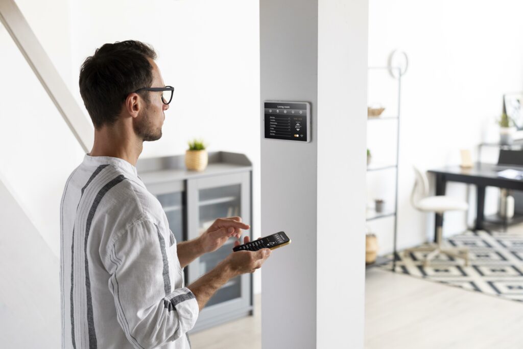 person using smartphone his automated home